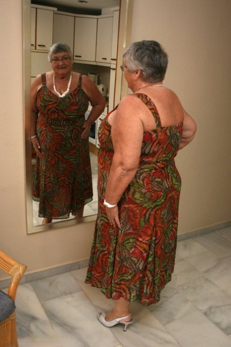 older tanned woman legs open